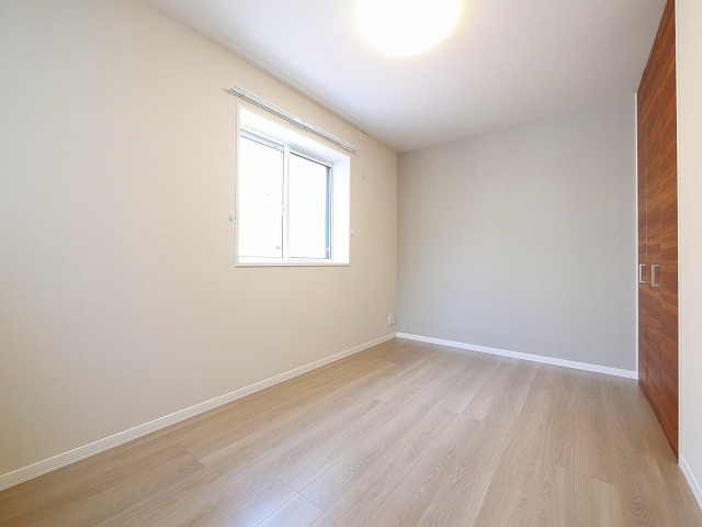 シャーメゾン生駒東新町の洋室