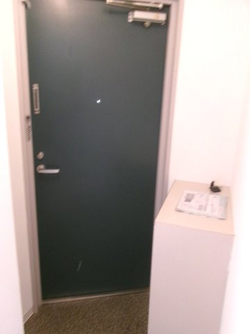 ポコアポコ明石本町メゾンの玄関