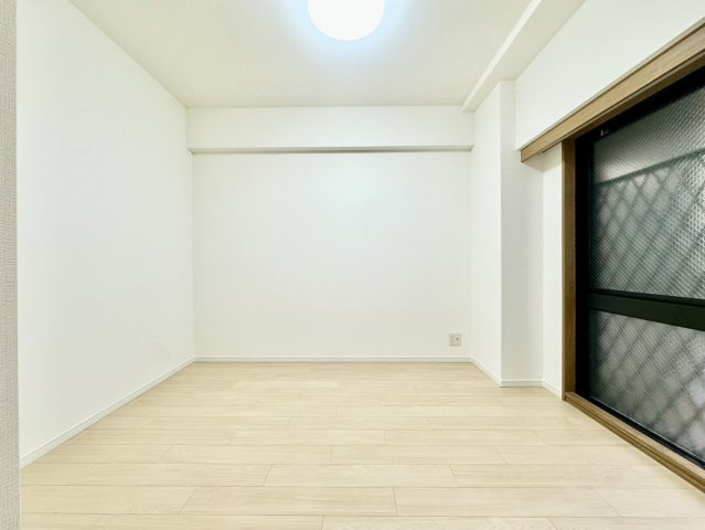 ナイスアーバンステイツ柏木の洋室