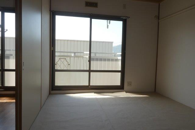 コーポサンライトⅠの居間・リビング|和室