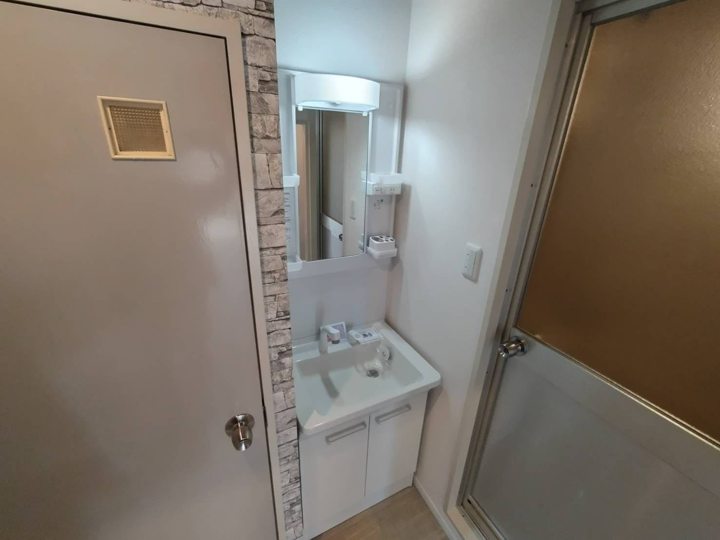 カネマンビルの洗面所|※写真はイメージです。色仕様は現況優先になります。