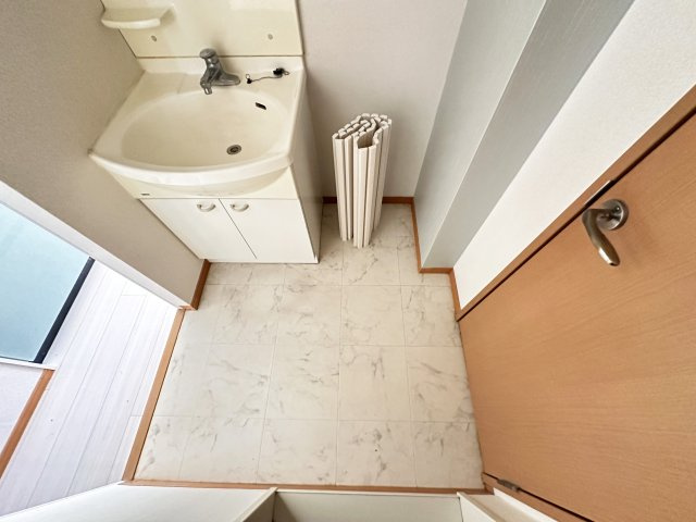 ミントグリーンの洗面所