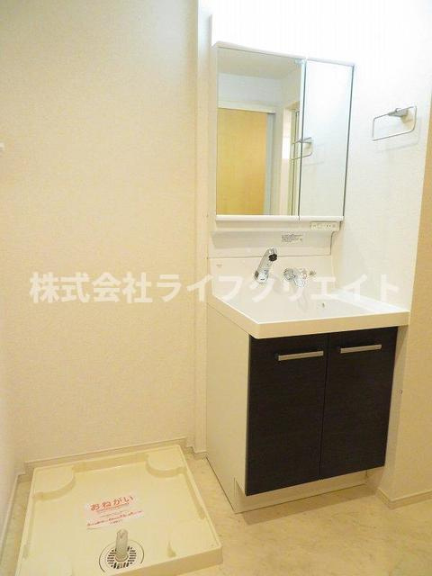 メゾンユウソウの洗面所