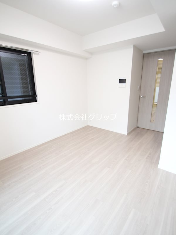 ジェノヴィア阪東橋Ⅱスカイガーデンの洋室