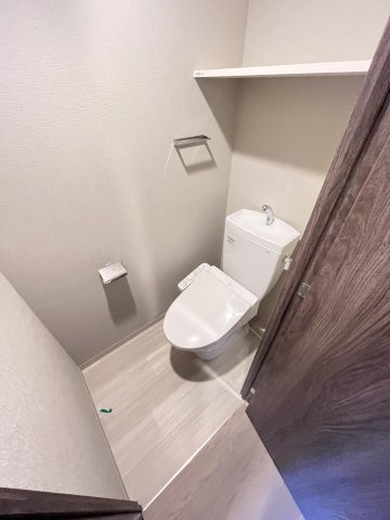 大阪市都島区片町２丁目の賃貸マンションのトイレ