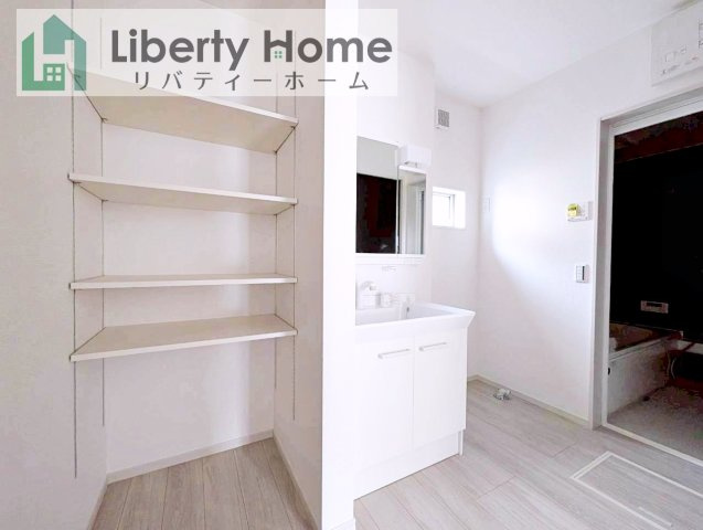 常総市豊岡町3期　新築戸建　1号棟の脱衣所