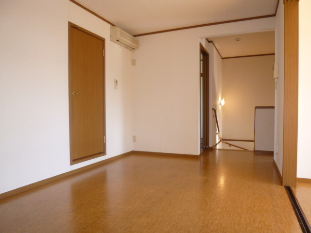 ファミールＦＵＪＩ　Ａの居間・リビング