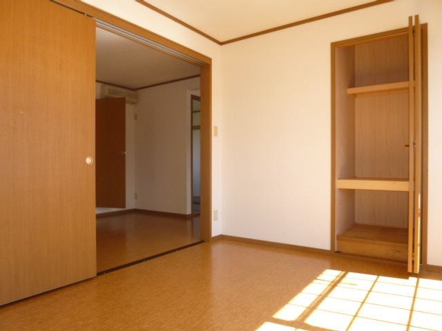 ファミールＦＵＪＩ　Ａの洋室