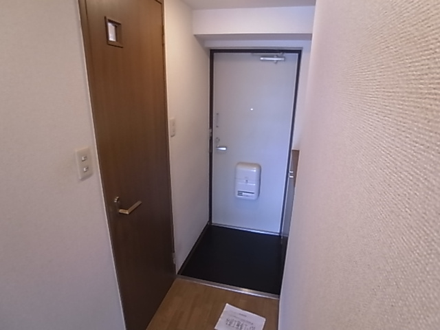 神戸市長田区東尻池町１丁目の賃貸マンションの玄関