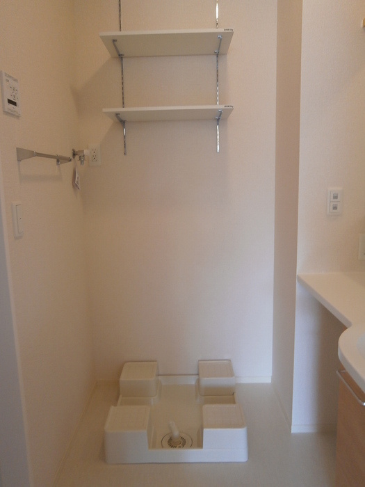 ボナールTOMO A棟|102 洗濯機置き場