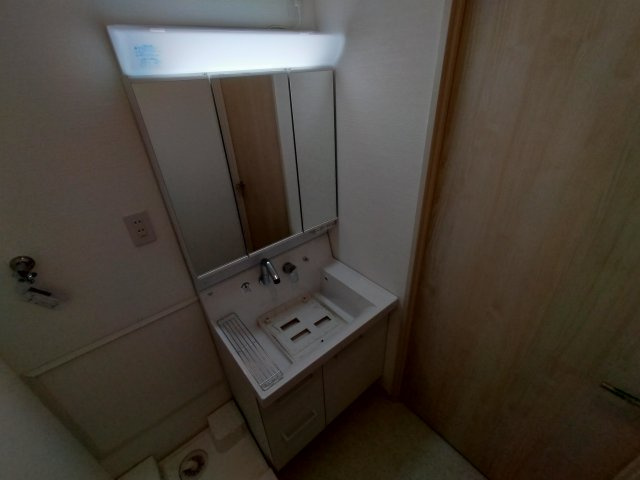 神戸市長田区松野通３丁目の賃貸マンションの洗面所