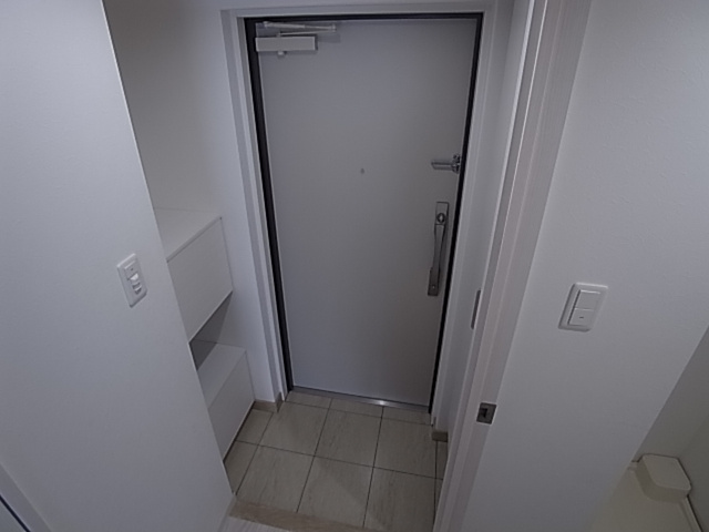 神戸市長田区菅原通５丁目の賃貸マンションの玄関