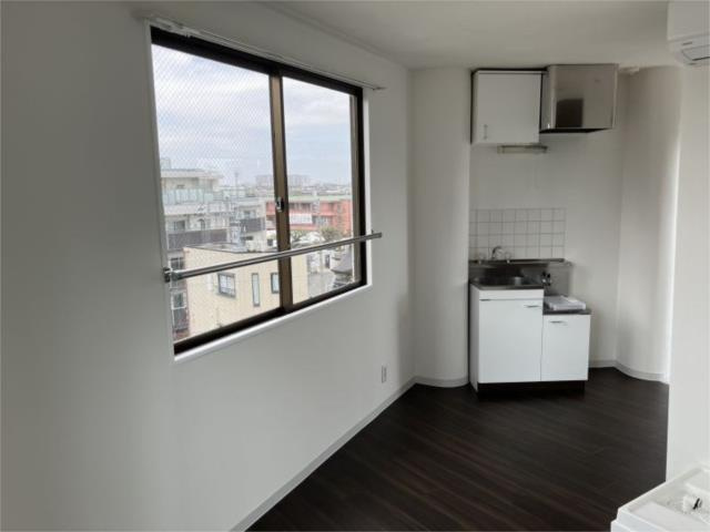 川崎市多摩区登戸の賃貸マンションの居間・リビング