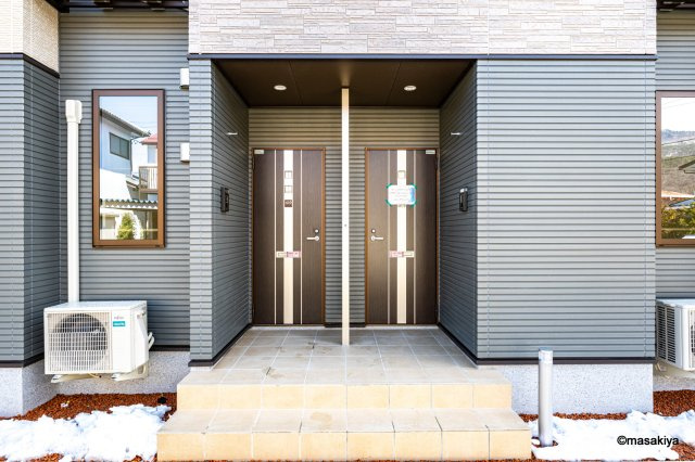 グランドハーモニーのエントランス|家賃割30％。割引期間は契約開始日より23ヶ月後の末日迄。