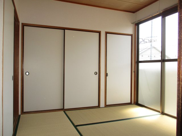 ロイヤル小塩IIIAの寝室