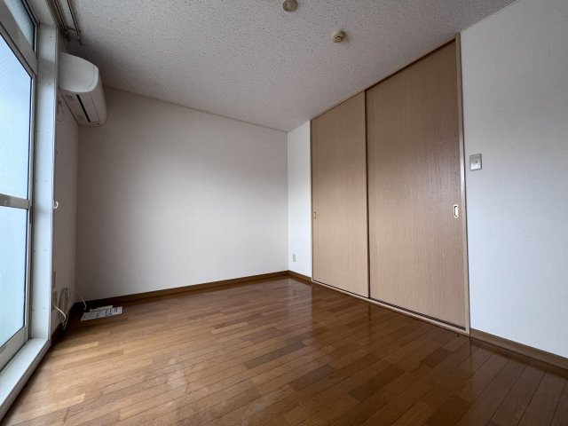 明石市大久保町江井島の賃貸マンションの居間・リビング