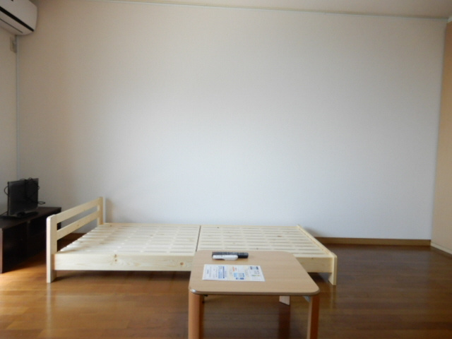 明石市魚住町住吉３丁目のアパートの寝室