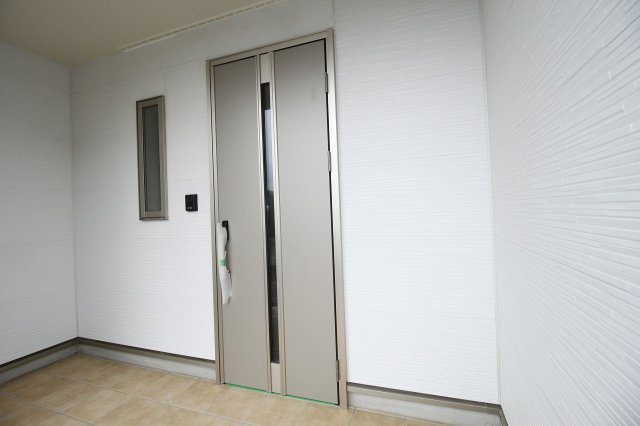 クレイドルガーデン第1　1号棟の玄関