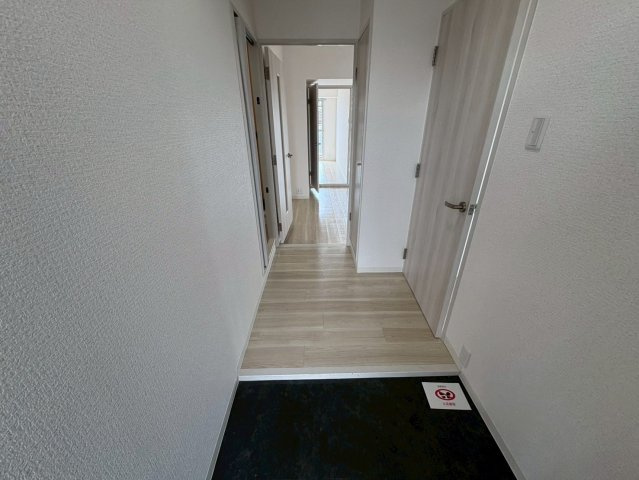 ヴィラスリースター鶴浜の玄関