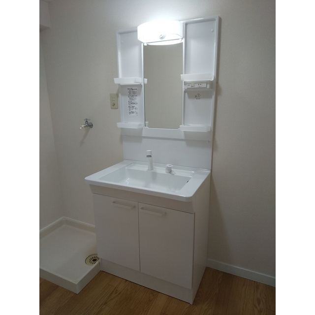 ホワイトマンションの洗面所|洗髪洗面化粧台