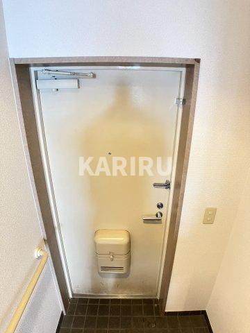 エレガンス川上の玄関
