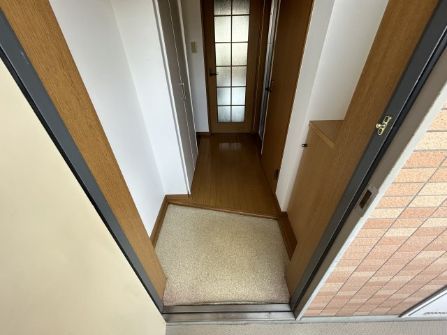 ポコアポコ明石鍛冶屋町五番館の玄関
