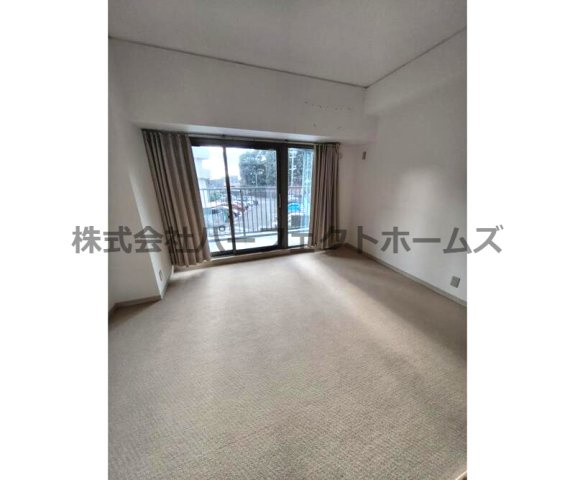 朝日プラザ香里菊ヶ丘の居間・リビング