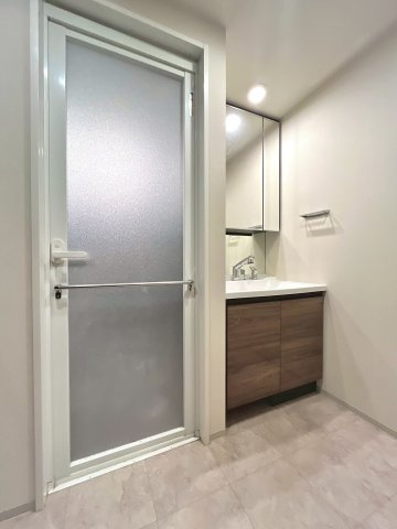 レーベン環状通東 THE RESIDENCEの脱衣所