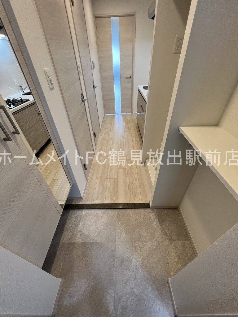 大阪市城東区鴫野東２丁目の賃貸マンションの玄関