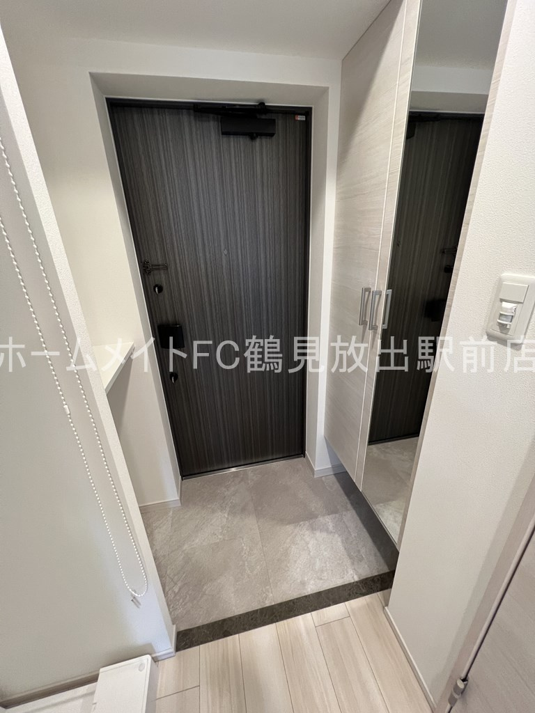 大阪市城東区鴫野東２丁目の賃貸マンションの玄関