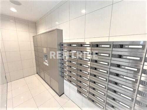 ライオンズ一宮栄のその他共用部分|その他共有部分：集合郵便受・宅配ボックス     （2025年3月撮影）