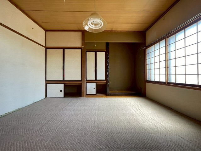 白糠町西1条南3丁目中古住宅の和室|1階　和室（絨毯）