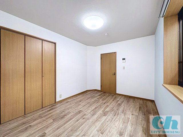 メゾンシャルム 101号室の居間・リビング