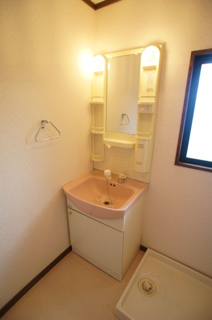 グランディールの洗面所|※別号室のお写真です