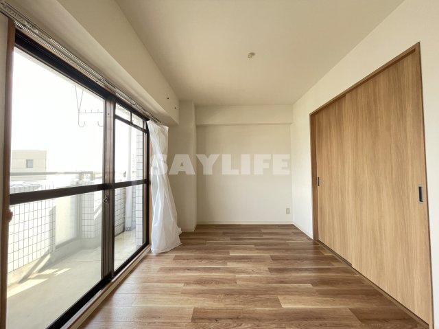 メゾンエスポアールの洋室