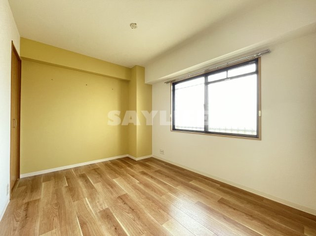 メゾンエスポアールの洋室