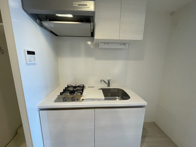 ジオエント福島野田のキッチン|同マンション反転タイプの部屋写真