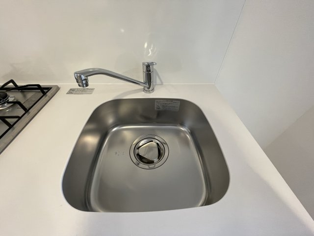 ジオエント福島野田のキッチン|同マンション反転タイプの部屋写真