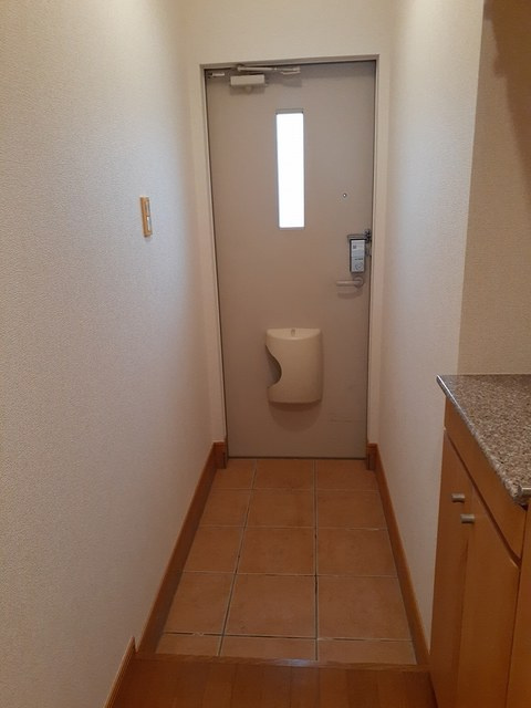 メゾンアンソレイエSの玄関