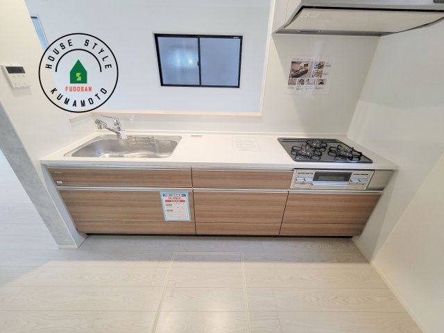 合志市幾久富第5-2棟（2号棟）　のキッチン|ご家族を近くに感じられる対面キッチンのLDK。会話もはずみそうですね。