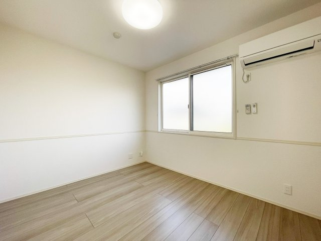 徳島市南二軒屋町新開のアパートの居間・リビング
