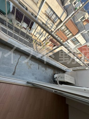 喜久マンションのバルコニー|暖かな日差しのふりそそぐバルコニー