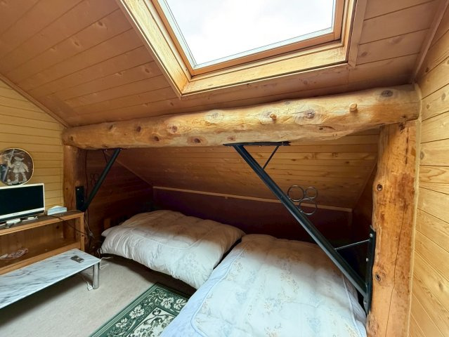 鶴居村【ログハウス】住居付き店舗兼ゲストハウスの洋室