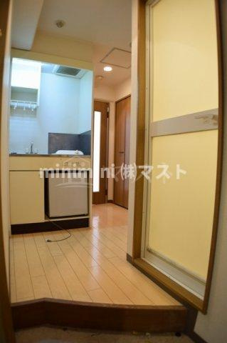 TATディナスティ西本町の玄関
