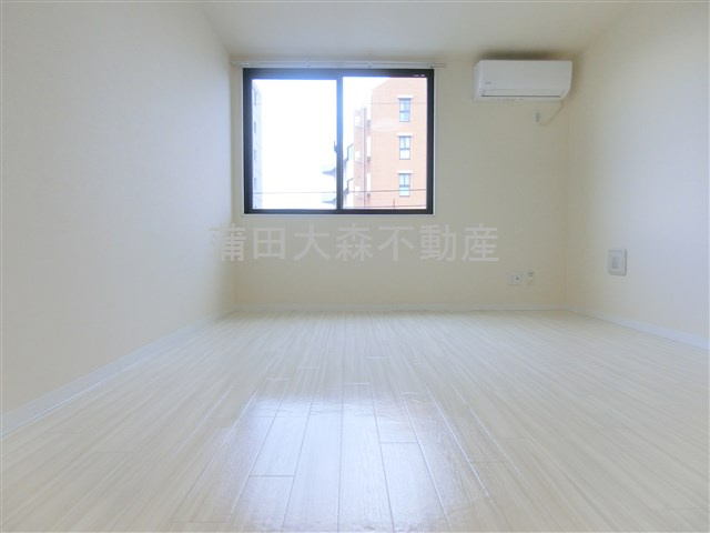 レピュア大森レジデンスの居間・リビング|洋室