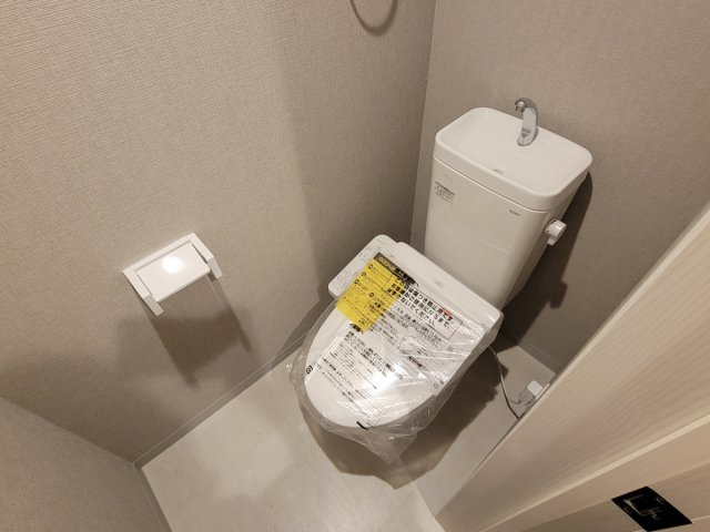 CRASTINE魚住町のトイレ