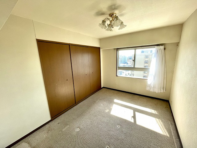 東峰マンション大牟田駅南の洋室