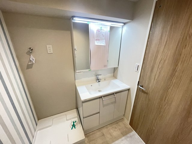 労住まきのハイツ一号棟の洗面所|ゆったりとスペースのある洗面所