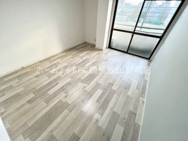大阪市城東区永田３丁目の賃貸マンションの洋室