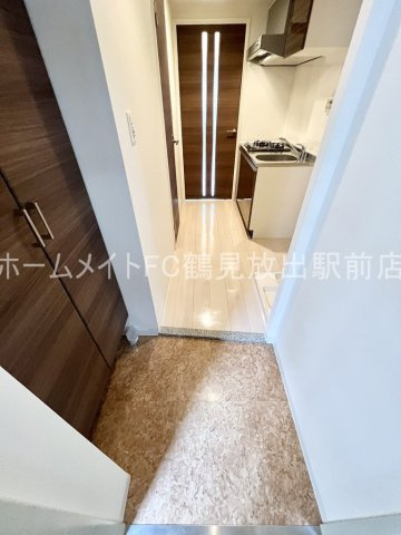大阪市城東区今福東３丁目の賃貸マンションの玄関